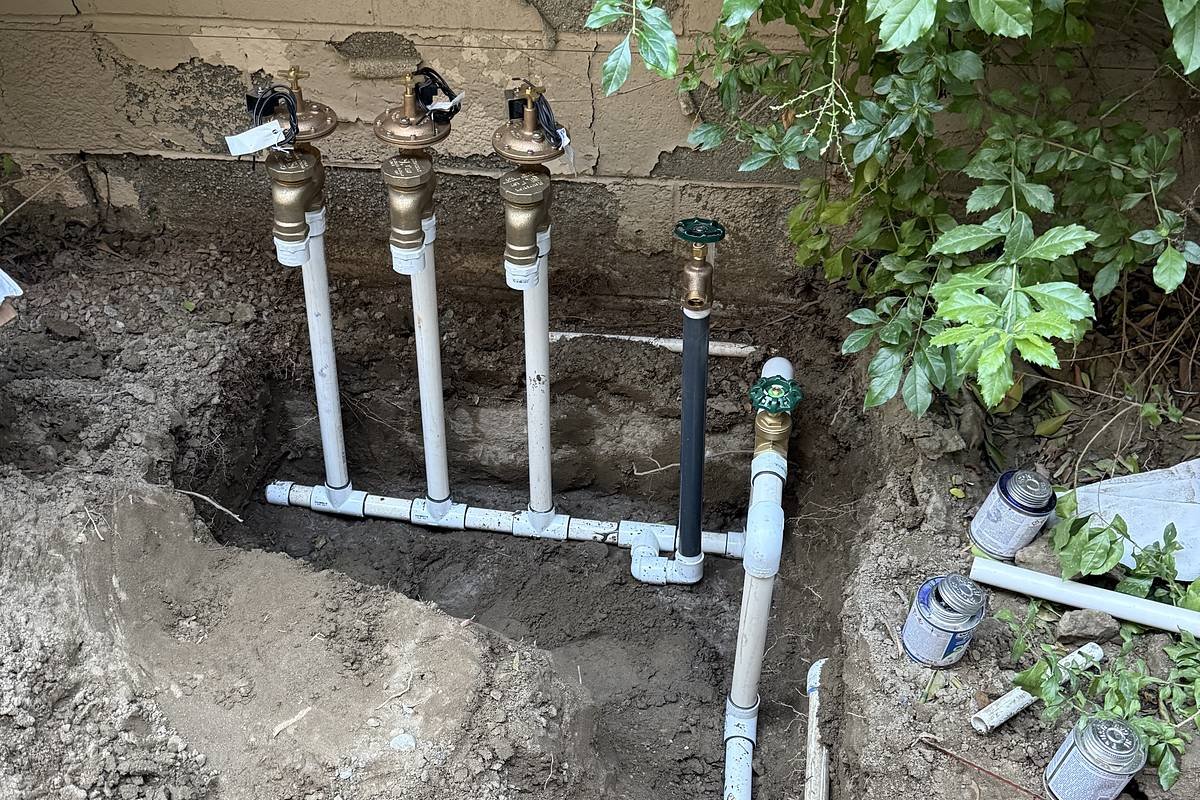 New irrigation valve manifold with PVC supply lines during installation